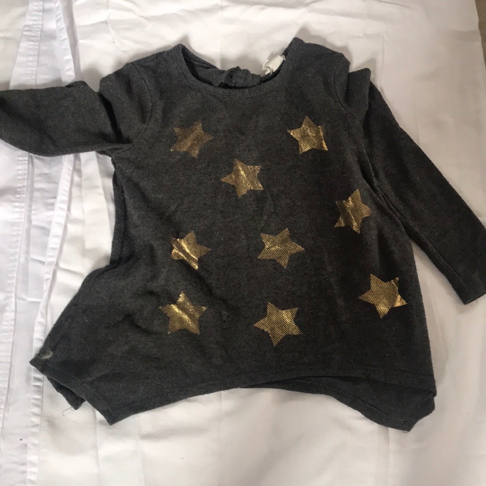 Between size 8 shirt